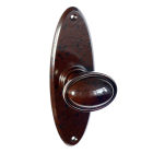 6825MOT<br />Walnut Brown Bakelite stepped oval door knobs on oval back plate
