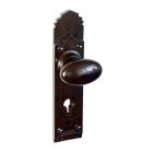 6844MOT<br />Walnut Brown Bakelite plain oval door knobs on deco back plates with keyhole